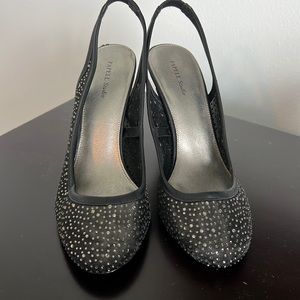 Glittery black stiletto sling back heels